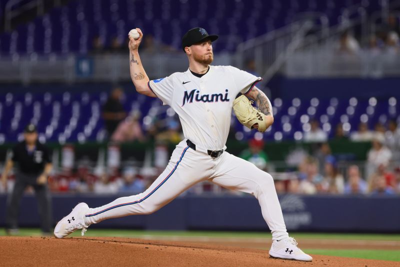 Sep 5, 2024; Miami, Florida, USA; Miami Marlins starting pitcher Adam Oller (77) delivers a pitch against the Philadelphia Phillies during the first inning at loanDepot Park. Mandatory Credit: Sam Navarro-Imagn Images