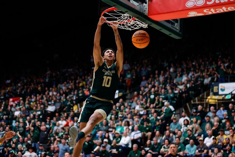 Mar 2, 2024; Fort Collins, Colorado, USA; Colorado State Rams guard Nique Clifford (10) dunks the ball in the first half against the Wyoming Cowboys at Moby Arena. Mandatory Credit: Isaiah J. Downing-USA TODAY Sports