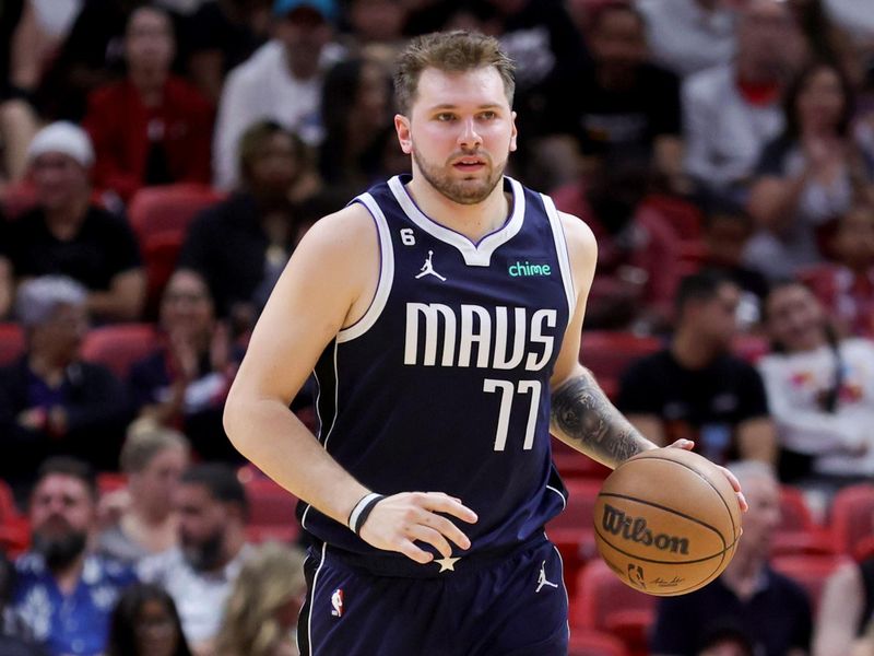 MIAMI, FLORIDA - APRIL 01: Luka Doncic #77 of the Dallas Mavericks in action against the Miami Heat during the second quarter at Miami-Dade Arena on April 01, 2023 in Miami, Florida. NOTE TO USER: User expressly acknowledges and agrees that, by downloading and or using this photograph, User is consenting to the terms and conditions of the Getty Images License Agreement. (Photo by Megan Briggs/Getty Images)