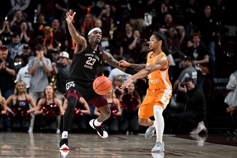 Feb 21, 2023; College Station, Texas, USA;   Tennessee Volunteers guard Zakai Zeigler (5) passes the ball against Texas A&M Aggies guard Tyrece Radford (23) during the second half at Reed Arena. Mandatory Credit: Maria Lysaker-USA TODAY Sports