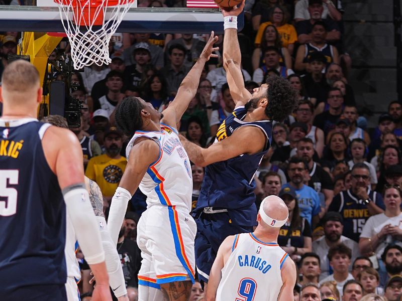 DENVER, CO - MAY 11: Jamal Murray #27 of the Denver Nuggets drives to the basket during the game against the Oklahoma City Thunder during Round 2 Game 4 of the 2025 NBA Playoffs on May 11, 2025 at Ball Arena in Denver, Colorado. NOTE TO USER: User expressly acknowledges and agrees that, by downloading and/or using this Photograph, user is consenting to the terms and conditions of the Getty Images License Agreement. Mandatory Copyright Notice: Copyright 2025 NBAE (Photo by Bart Young/NBAE via Getty Images)