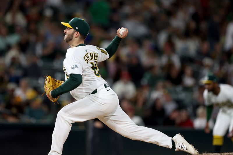 May 23, 2025; West Sacramento, California, USA; Athletics pitcher Justin Sterner (60) throws a pitch against the Philadelphia Phillies during the eighth inning at Sutter Health Park. Mandatory Credit: Dennis Lee-Imagn Images