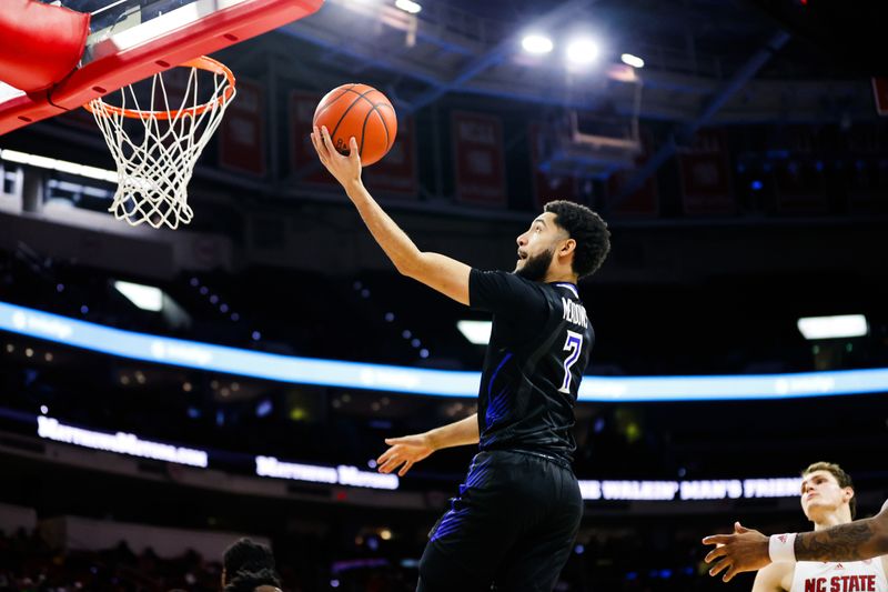 Dec 20, 2023; Raleigh, North Carolina, USA; Saint Louis Billikens guard Michael Meadows Jr. (7) dunks the ball during the second half against North Carolina State Wolfpack at PNC Arena. Mandatory Credit: Jaylynn Nash-USA TODAY Sports