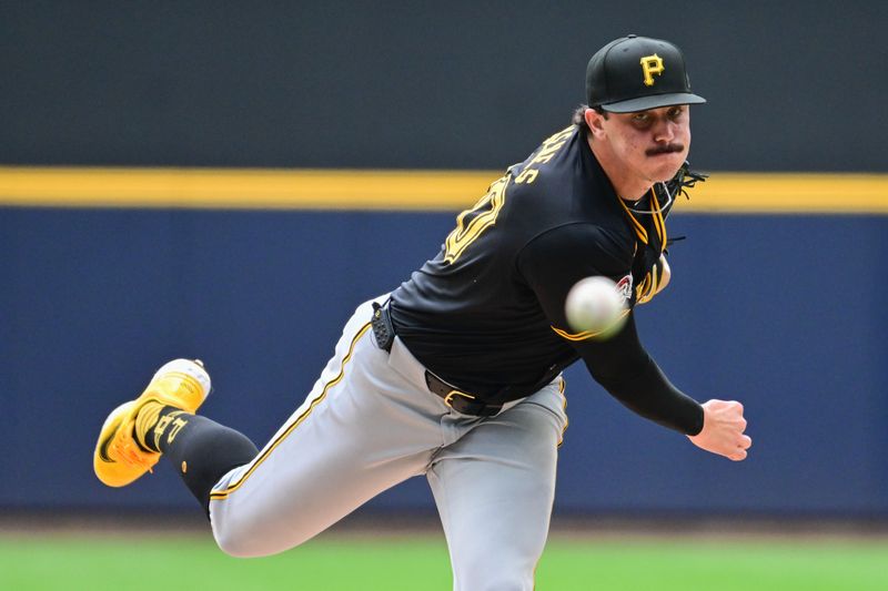 Jul 11, 2024; Milwaukee, Wisconsin, USA; Pittsburgh Pirates starting pitcher Paul Skenes (30) pitches in the first inning against the Milwaukee Brewers at American Family Field. Mandatory Credit: Benny Sieu-USA TODAY Sports