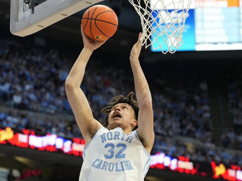 Jan 13, 2024; Chapel Hill, North Carolina, USA;  North Carolina Tar Heels forward James Okonkwo (32) scores in the second half at Dean E. Smith Center. Mandatory Credit: Bob Donnan-USA TODAY Sports