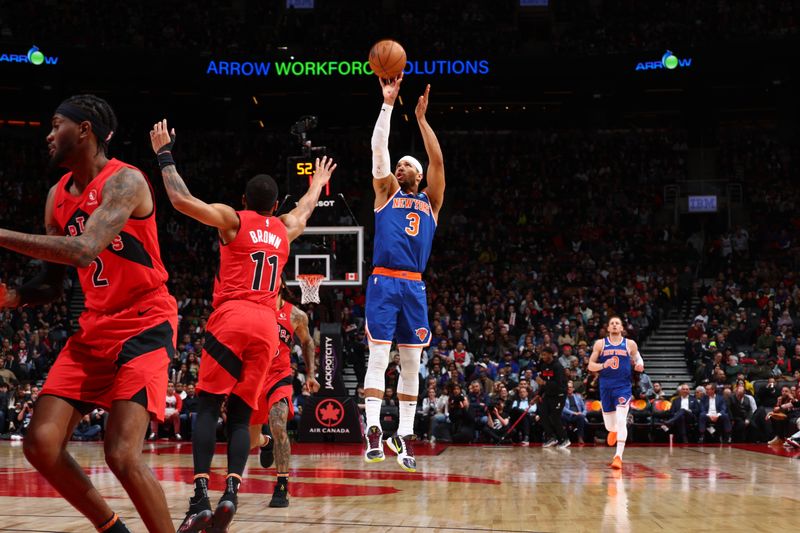 TORONTO, CANADA - MARCH 27: Josh Hart #3 of the New York Knicks shoots the ball during the game against the Toronto Raptors on March 27, 2024 at the Scotiabank Arena in Toronto, Ontario, Canada.  NOTE TO USER: User expressly acknowledges and agrees that, by downloading and or using this Photograph, user is consenting to the terms and conditions of the Getty Images License Agreement.  Mandatory Copyright Notice: Copyright 2024 NBAE (Photo by Vaughn Ridley/NBAE via Getty Images)