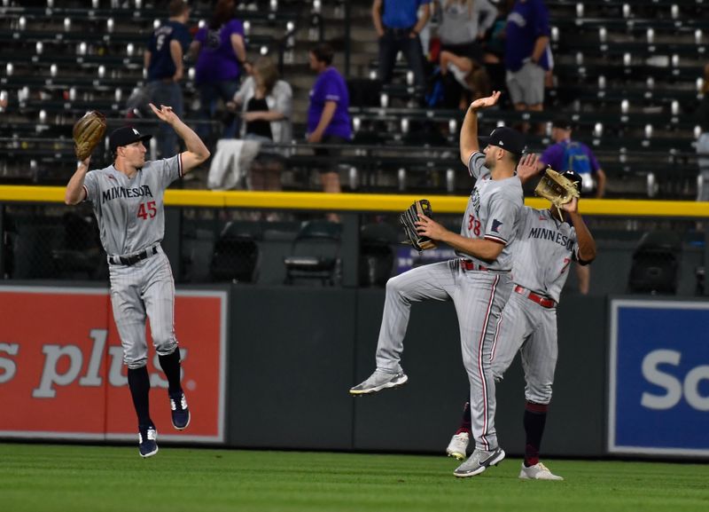 Sep 30, 2023; Denver, Colorado, USA; Minnesota Twins center fielder Andrew Stevenson (45) Minnesota Twins left fielder Matt Wallner (38) and Minnesota Twins center fielder Michael A. Taylor (2) celebrate the win over the Colorado Rockies at Coors Field. Mandatory Credit: John Leyba-USA TODAY Sports