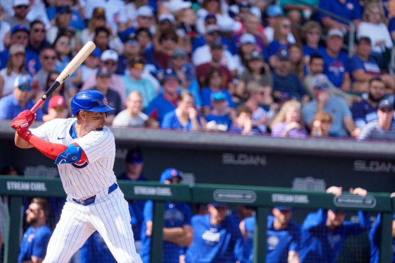 Feb 25, 2024; Mesa, Arizona, USA; Chicago Cubs infielder Christopher Morel (5) at bat in the fourth inning during a spring training game at Sloan Park against the San Diego Padres. Mandatory Credit: Allan Henry-USA TODAY Sports