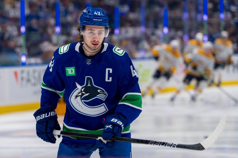 Apr 23, 2024; Vancouver, British Columbia, CAN;  Vancouver Canucks defenseman Quinn Hughes (43) skates in warm up prior to game two of the first round of the 2024 Stanley Cup Playoffs against the Nashville Predators at Rogers Arena. Mandatory Credit: Bob Frid-USA TODAY Sports