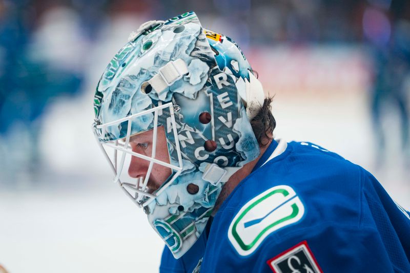Oct 3, 2025; Vancouver, British Columbia, CAN; Vancouver Canucks goalie Thatcher Demko (35) rests during warm up prior to a game against the Edmonton Oilers at Rogers Arena. Mandatory Credit: Bob Frid-Imagn Images