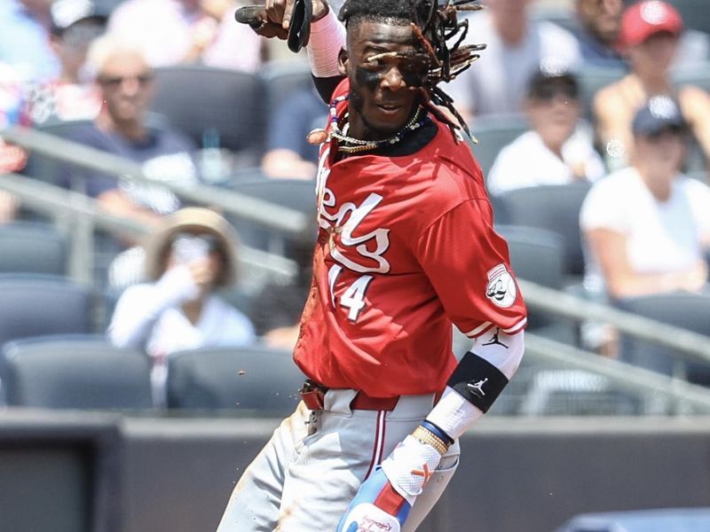 Jul 4, 2024; Bronx, New York, USA; Cincinnati Reds shortstop Elly De La Cruz (44) runs to third base after a throwing error in the infield in the first inning against the New York Yankees at Yankee Stadium. Mandatory Credit: Wendell Cruz-USA TODAY Sports
