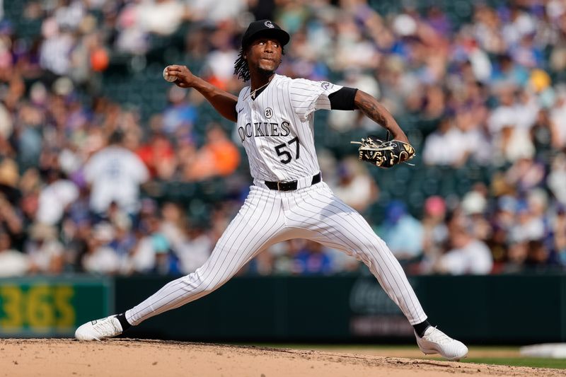 Sep 15, 2024; Denver, Colorado, USA; Colorado Rockies relief pitcher Angel Chivilli (57) pitches in the eighth inning against the Chicago Cubs at Coors Field. Mandatory Credit: Isaiah J. Downing-Imagn Images