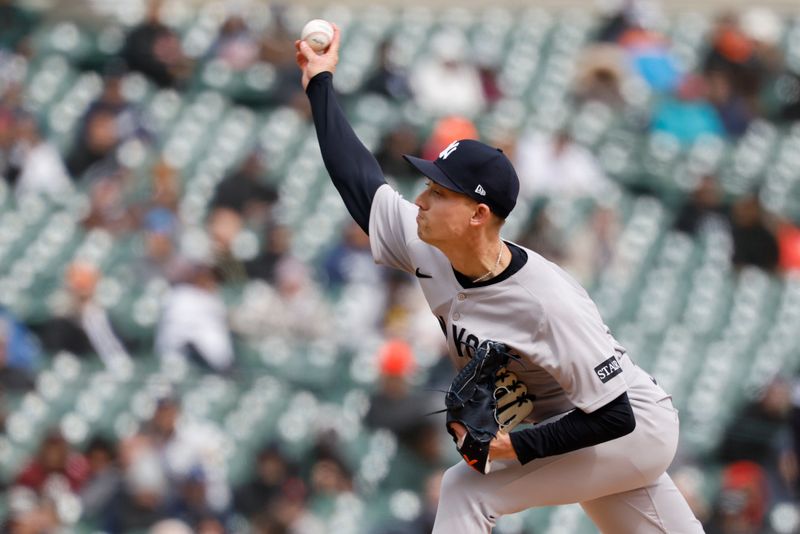 Apr 9, 2025; Detroit, Michigan, USA;  New York Yankees pitcher Luke Weaver (30) pitches in the eighth inning against the Detroit Tigers at Comerica Park. Mandatory Credit: Rick Osentoski-Imagn Images