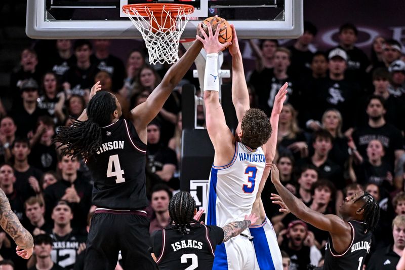 Feb 7, 2026; College Station, Texas, USA; Florida Gators center Micah Handlogten (3) blocks a shot from Texas A&M Aggies forward Jamie Vinson (4) during the first half at Reed Arena. Mandatory Credit: Maria Lysaker-Imagn Images 