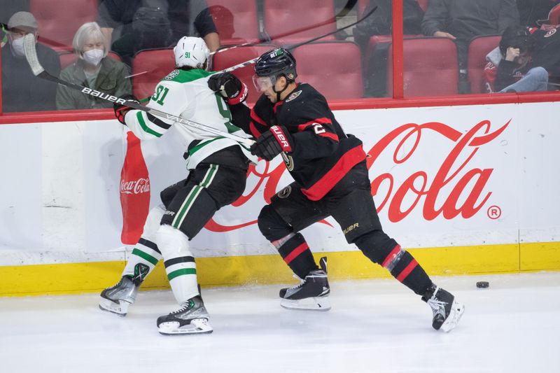 Oct 24, 2022; Ottawa, Ontario, CAN; Ottawa Senators defenseman Artem Zub (2) takes Dallas Stars center Tyler Seguin (91) off the puck in the third period at the Canadian Tire Centre. Mandatory Credit: Marc DesRosiers-USA TODAY Sports