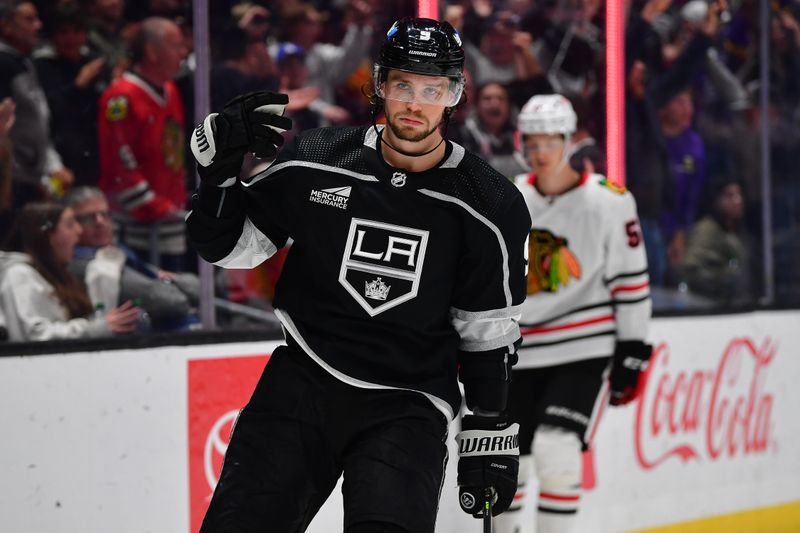 Apr 18, 2024; Los Angeles, California, USA; Los Angeles Kings right wing Adrian Kempe (9) celebrates his goal scored against the Chicago Blackhawks in the overtime period at Crypto.com Arena. Mandatory Credit: Gary A. Vasquez-USA TODAY Sports