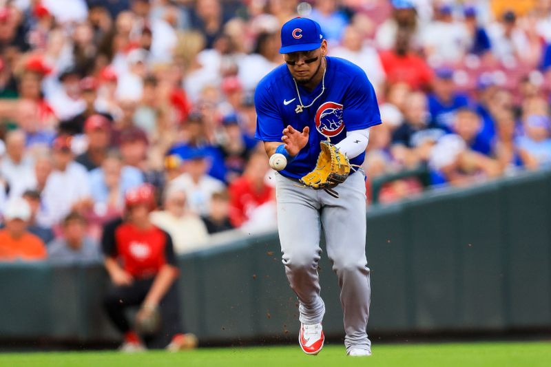 Jul 30, 2024; Cincinnati, Ohio, USA; Chicago Cubs third baseman Isaac Paredes (17) grounds the ball hit by Cincinnati Reds third baseman Noelvi Marte (not pictured) in the third inning at Great American Ball Park. Mandatory Credit: Katie Stratman-USA TODAY Sports