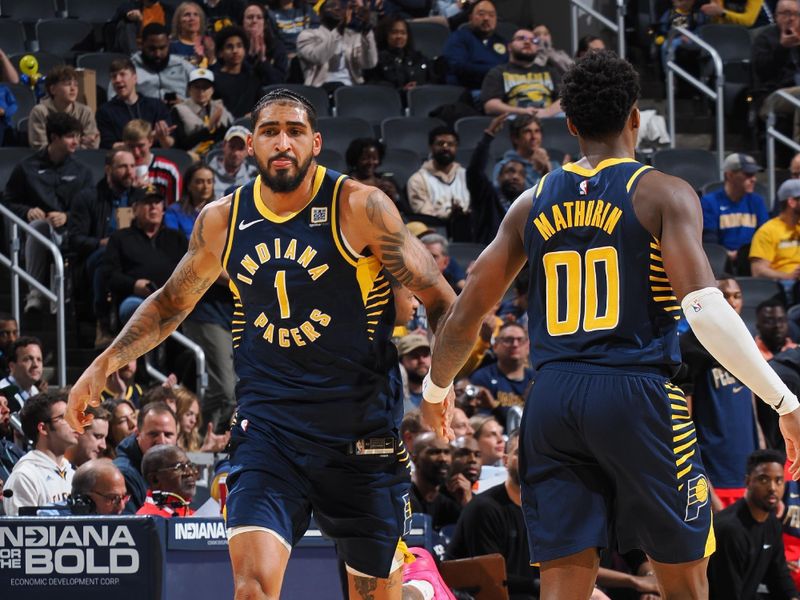 INDIANAPOLIS, IN - NOVEMBER 25: Obi Toppin #1 and Bennedict Mathurin #00 of the Indiana Pacers high five during the game against the New Orleans Pelicans on November 25, 2024 at Gainbridge Fieldhouse in Indianapolis, Indiana. NOTE TO USER: User expressly acknowledges and agrees that, by downloading and or using this Photograph, user is consenting to the terms and conditions of the Getty Images License Agreement. Mandatory Copyright Notice: Copyright 2024 NBAE (Photo by Ron Hoskins/NBAE via Getty Images)