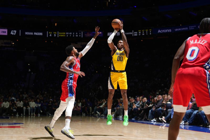 PHILADELPHIA, PA - DECEMBER 13: Bennedict Mathurin #00 of the Indiana Pacers shoots a three point basket during the game  against the Philadelphia 76ers on December 13, 2024 at the Wells Fargo Center in Philadelphia, Pennsylvania NOTE TO USER: User expressly acknowledges and agrees that, by downloading and/or using this Photograph, user is consenting to the terms and conditions of the Getty Images License Agreement. Mandatory Copyright Notice: Copyright 2024 NBAE (Photo by Jesse D. Garrabrant/NBAE via Getty Images)