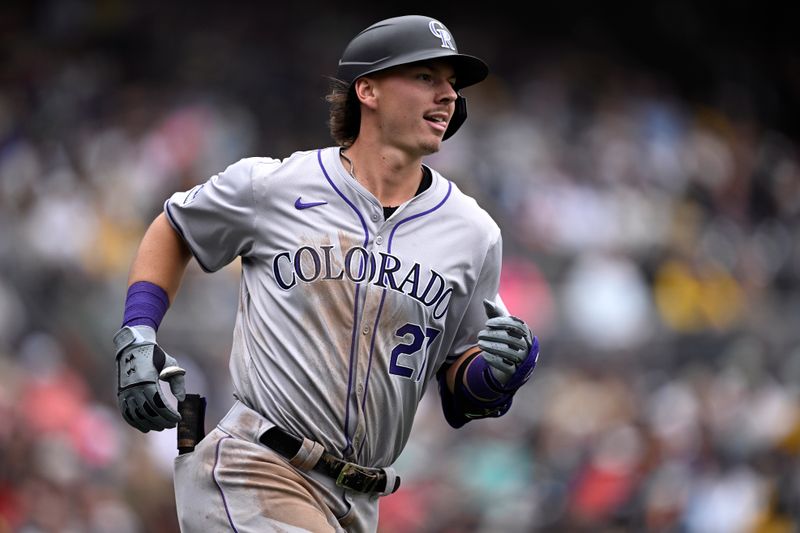 May 15, 2024; San Diego, California, USA; Colorado Rockies left fielder Jordan Beck (27) rounds the bases after hitting a two-run home run against the San Diego Padres during the sixth inning at Petco Park. Mandatory Credit: Orlando Ramirez-USA TODAY Sports