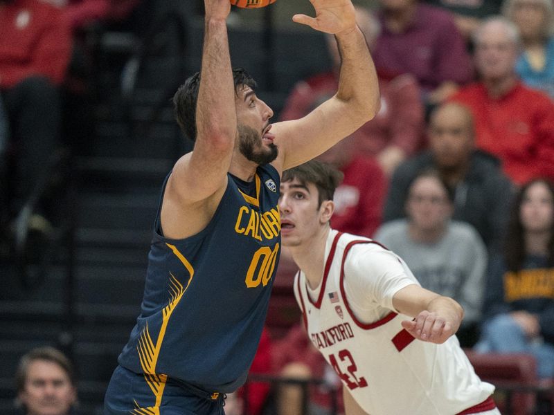 Mar 7, 2024; Stanford, California, USA; California Golden Bears forward Fardaws Aimaq (00) shoots the basketball against Stanford Cardinal forward Maxime Raynaud (42) during the first half at Maples Pavillion. Mandatory Credit: Neville E. Guard-USA TODAY Sports