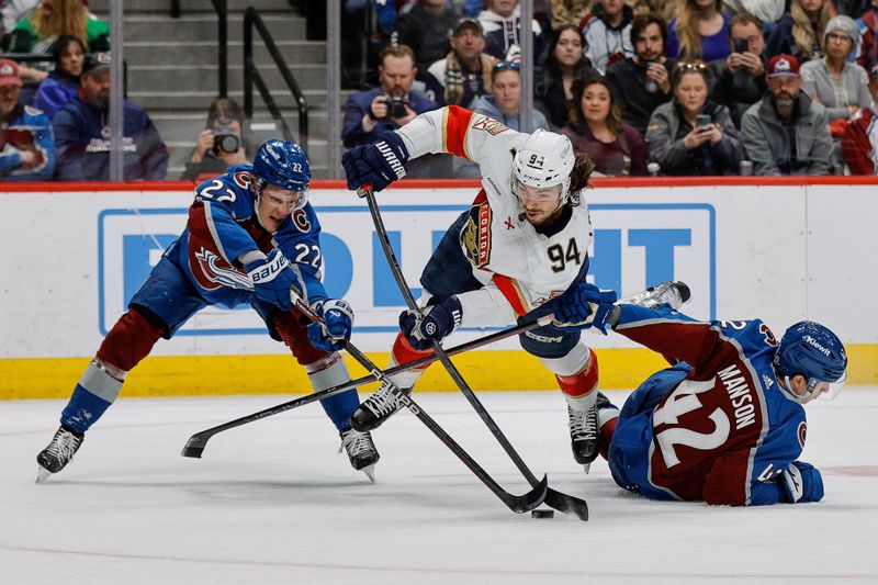 Jan 6, 2024; Denver, Colorado, USA; Florida Panthers left wing Ryan Lomberg (94) gets tied up with Colorado Avalanche left wing Fredrik Olofsson (22) and defenseman Josh Manson (42) in the first period at Ball Arena. Mandatory Credit: Isaiah J. Downing-USA TODAY Sports