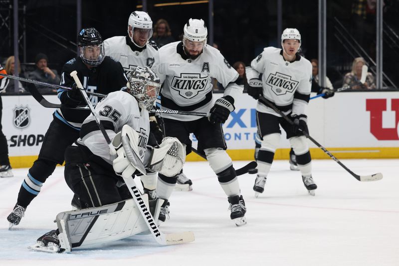 Apr 3, 2025; Salt Lake City, Utah, USA; Los Angeles Kings goaltender Darcy Kuemper (35) makes a save against the Utah Hockey Club during the second period at Delta Center. Mandatory Credit: Rob Gray-Imagn Images