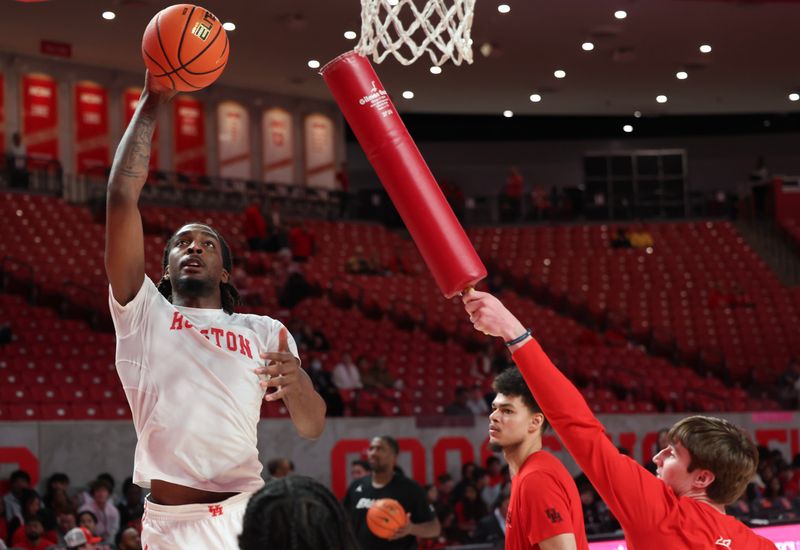 Jan 15, 2025; Houston, Texas, USA;  Houston Cougars forward Ja'Vier Francis (5) warms up before playing the West Virginia Mountaineers at Fertitta Center. Mandatory Credit: Thomas Shea-Imagn Images