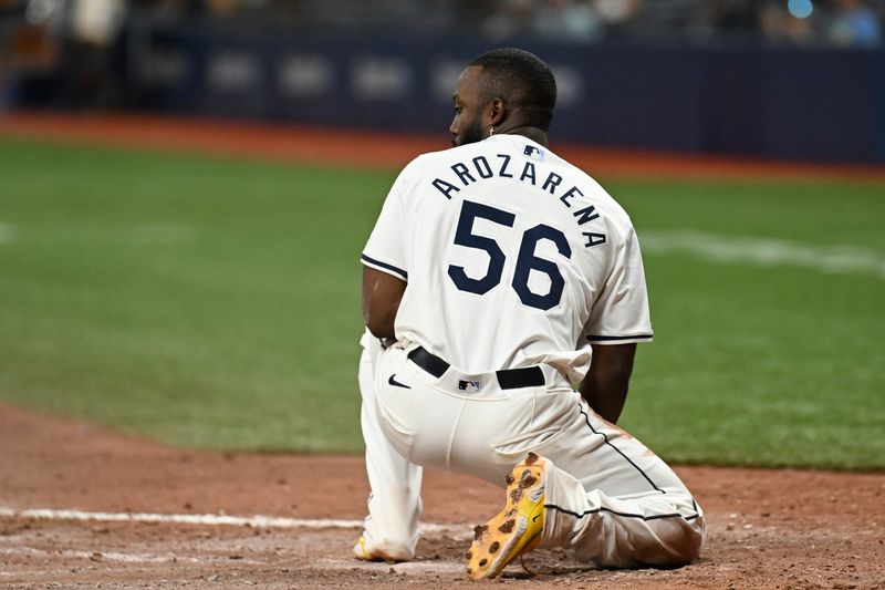 May 29, 2024; St. Petersburg, Florida, USA; Tampa Bay Rays left fielder Randy Arozarena (56) reacts after getting tagged out attempting to steal home in the sixth inning against the Oakland Athletics at Tropicana Field. Mandatory Credit: Jonathan Dyer-USA TODAY Sports