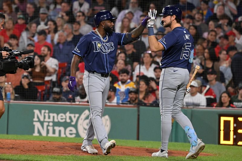 May 14, 2024; Boston, Massachusetts, USA; Tampa Bay Rays left fielder Randy Arozarena (56) celebrates hitting a home run during the sixth inning against the Boston Red Sox with right fielder Josh Lowe (15)at Fenway Park. Mandatory Credit: Eric Canha-USA TODAY Sports