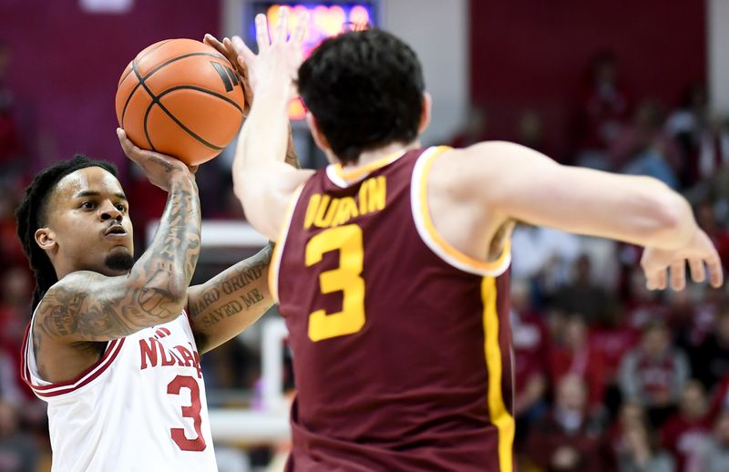 Mar 4, 2026; Bloomington, Indiana, USA; Indiana Hoosiers guard Lamar Wilkerson (3) shoots over Minnesota Golden Gophers forward Bobby Durkin (3) during the first half at Simon Skjodt Assembly Hall. Mandatory Credit: Robert Goddin-Imagn Images