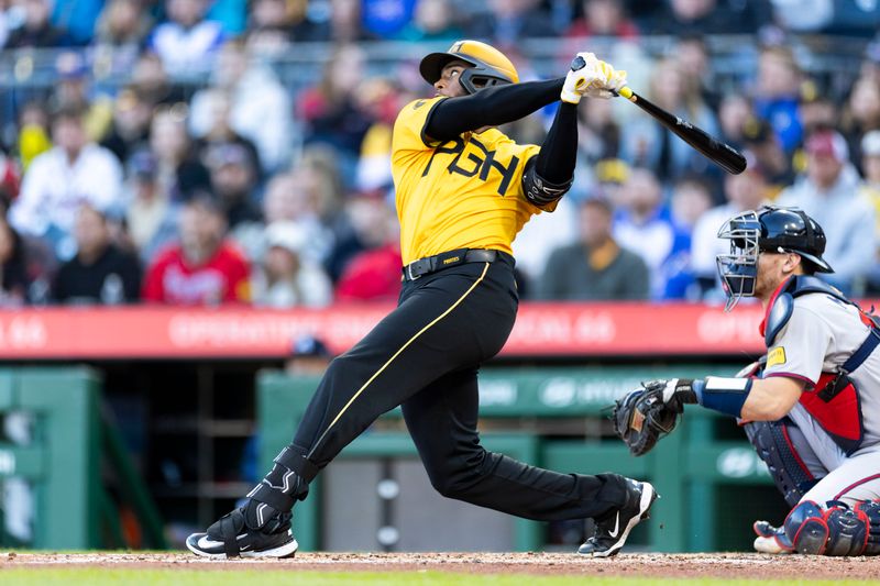 May 9, 2025; Pittsburgh, Pennsylvania, USA; Pittsburgh Pirates outfielder Alexander Canario (29) hits a home run against the Atlanta Braves during the third inning at PNC Park. Mandatory Credit: Scott Galvin-Imagn Images