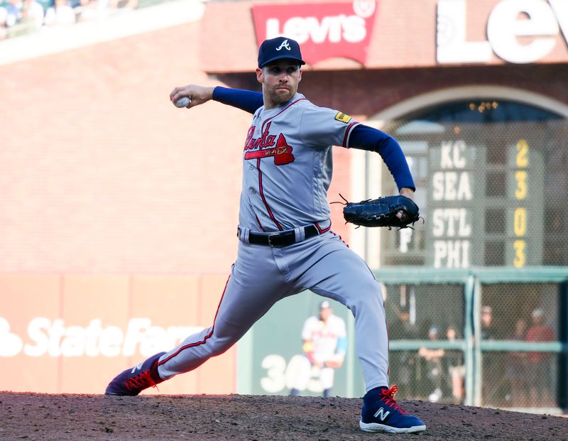 Aug 27, 2023; San Francisco, California, USA; Atlanta Braves relief pitcher Collin McHugh (32) pitches the ball against the San Francisco Giants during the sixth inning at Oracle Park. Mandatory Credit: Kelley L Cox-USA TODAY Sports