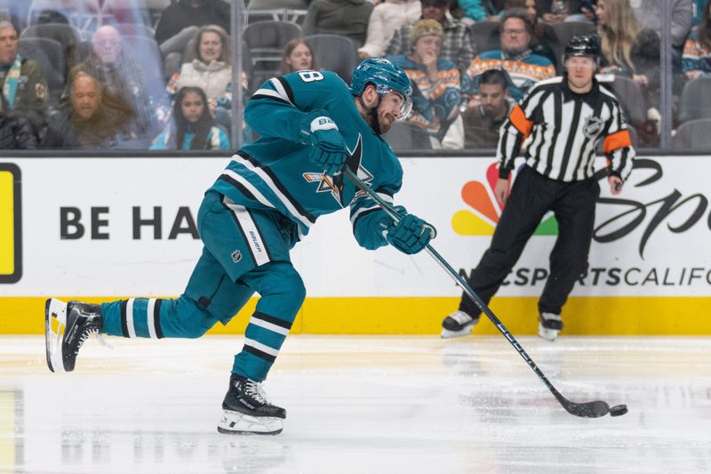 Dec 21, 2023; San Jose, California, USA; San Jose Sharks right wing Filip Zadina (18) shoots the puck during the second period against the Arizona Coyotes at SAP Center at San Jose. Mandatory Credit: Stan Szeto-USA TODAY Sports