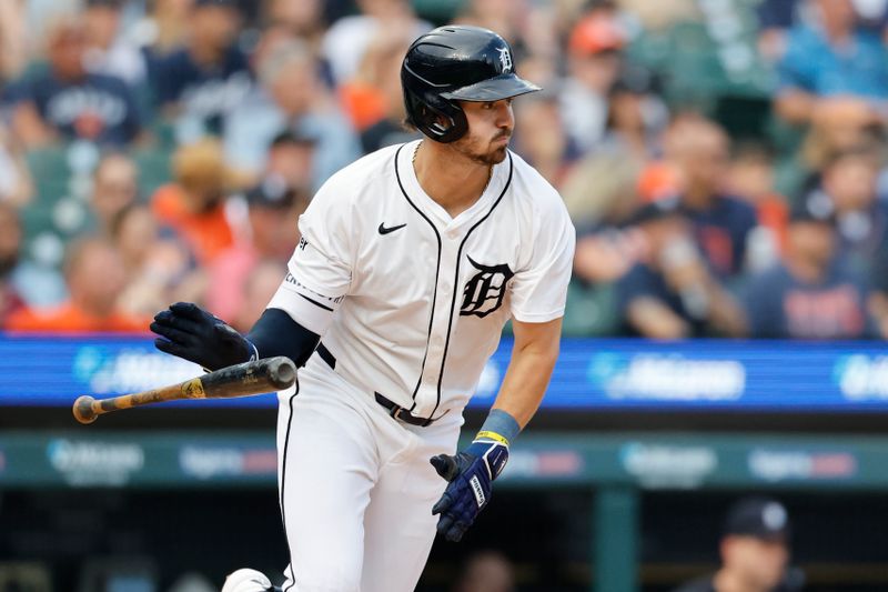 Jul 9, 2025; Detroit, Michigan, USA;  Detroit Tigers third baseman Zach McKinstry (39) hits an RBI double in the fourth inning against the Tampa Bay Rays at Comerica Park. Mandatory Credit: Rick Osentoski-Imagn Images