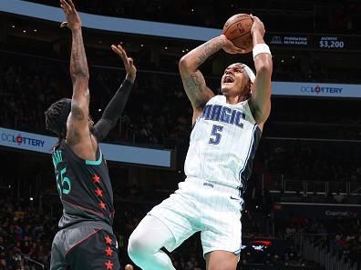 WASHINGTON, DC -? DECEMBER 26: Paolo Banchero #5 of the Orlando Magic goes to the basket during the game  on December 26, 2023 at Capital One Arena in Washington, DC. NOTE TO USER: User expressly acknowledges and agrees that, by downloading and or using this Photograph, user is consenting to the terms and conditions of the Getty Images License Agreement. Mandatory Copyright Notice: Copyright 2023 NBAE (Photo by Stephen Gosling/NBAE via Getty Images)