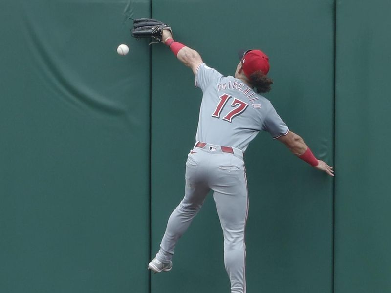 Jun 19, 2024; Pittsburgh, Pennsylvania, USA;  Cincinnati Reds center tfielder Stuart Fairchild (17) cannot make a catch on a ball hit for a double by Pittsburgh Pirates first baseman Rowdy Tellez (not pictured) during the seventh inning at PNC Park.  The Pirates shutout the Reds 1-0. Mandatory Credit: Charles LeClaire-USA TODAY Sports