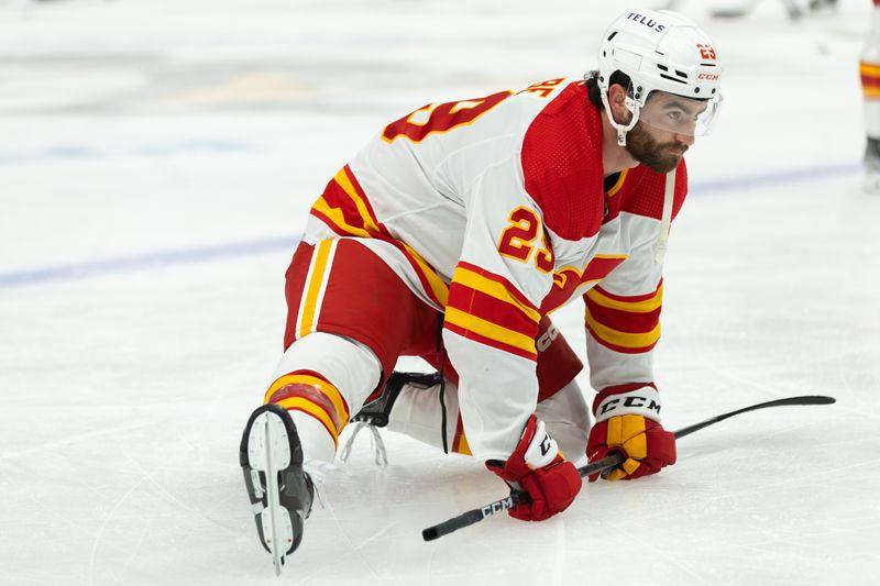 Oct 14, 2023; Pittsburgh, Pennsylvania, USA; Calgary Flames center Billon Dube (29) stretches during warm up before the game against the Pittsburgh Penguins at PPG Paints Arena. Mandatory Credit: Scott Galvin-USA TODAY Sports