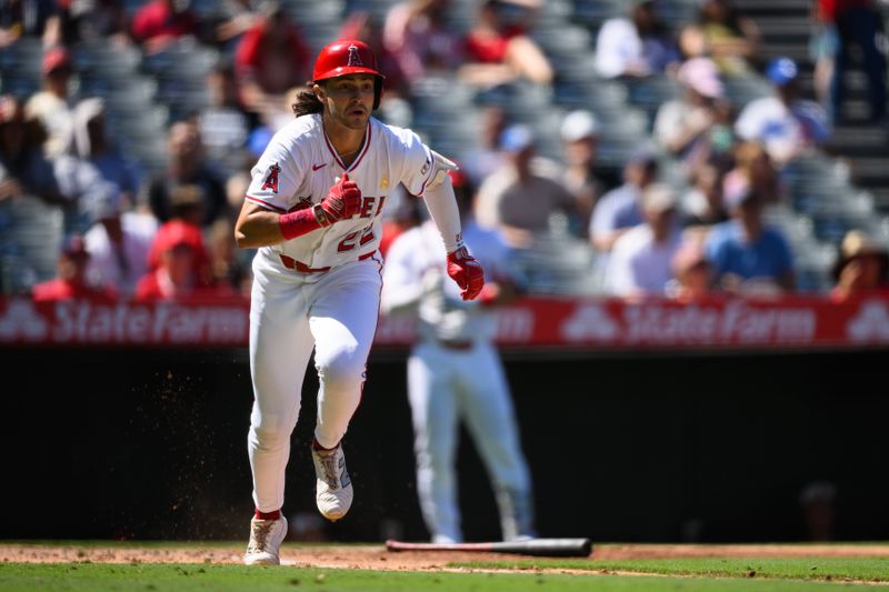 Sep 7, 2025; Anaheim, California, USA; Los Angeles Angels center fielder Bryce Teodosio (22) runs after hitting a RBI double against the Athletics during the fourth inning at Angel Stadium. Mandatory Credit: William Liang-Imagn Images
