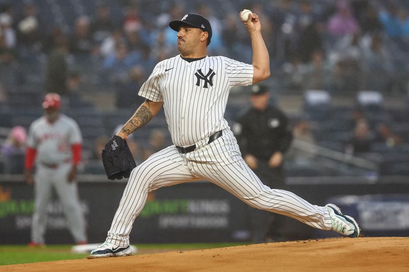 Aug 8, 2024; Bronx, New York, USA;  New York Yankees starting pitcher Nestor Cortes (65) pitches in the first inning against the Los Angeles Angels at Yankee Stadium. Mandatory Credit: Wendell Cruz-USA TODAY Sports