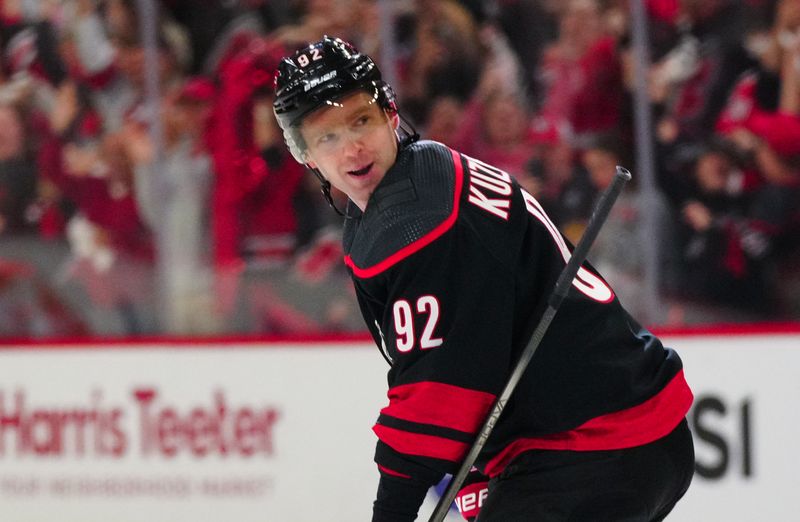 Apr 30, 2024; Raleigh, North Carolina, USA; Carolina Hurricanes center Evgeny Kuznetsov (92) scores a penalty shot goal against New York Islanders during the first period in game five of the first round of the 2024 Stanley Cup Playoffs at PNC Arena. Mandatory Credit: James Guillory-USA TODAY Sports