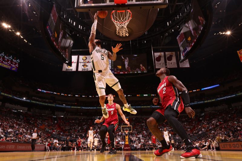 MIAMI, FL - NOVEMBER 26: Gary Trent Jr. #5 of the Milwaukee Bucks drives to the basket during the game against the Miami Heat during the Emirates NBA Cup game on November 26, 2024 at Kaseya Center in Miami, Florida. NOTE TO USER: User expressly acknowledges and agrees that, by downloading and or using this Photograph, user is consenting to the terms and conditions of the Getty Images License Agreement. Mandatory Copyright Notice: Copyright 2024 NBAE (Photo by Issac Baldizon/NBAE via Getty Images)