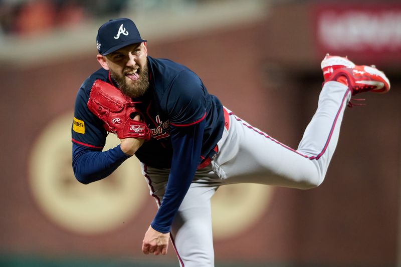 Jun 6, 2025; San Francisco, California, USA; Atlanta Braves pitcher Dylan Lee (52) throws a pitch against the San Francisco Giants during the eighth inning at Oracle Park. Mandatory Credit: Robert Edwards-Imagn Images