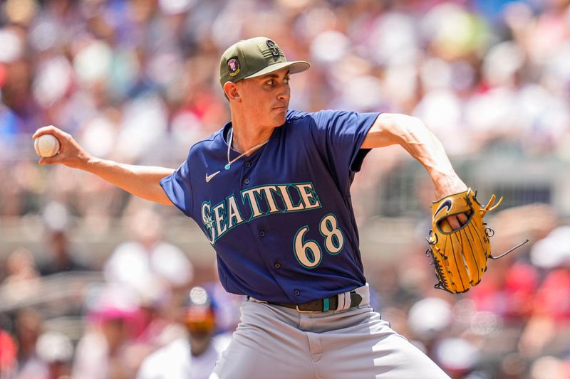 May 21, 2023; Cumberland, Georgia, USA; Seattle Mariners starting pitcher George Kirby (68) pitches against the Atlanta Braves during the third inning at Truist Park. Mandatory Credit: Dale Zanine-USA TODAY Sports