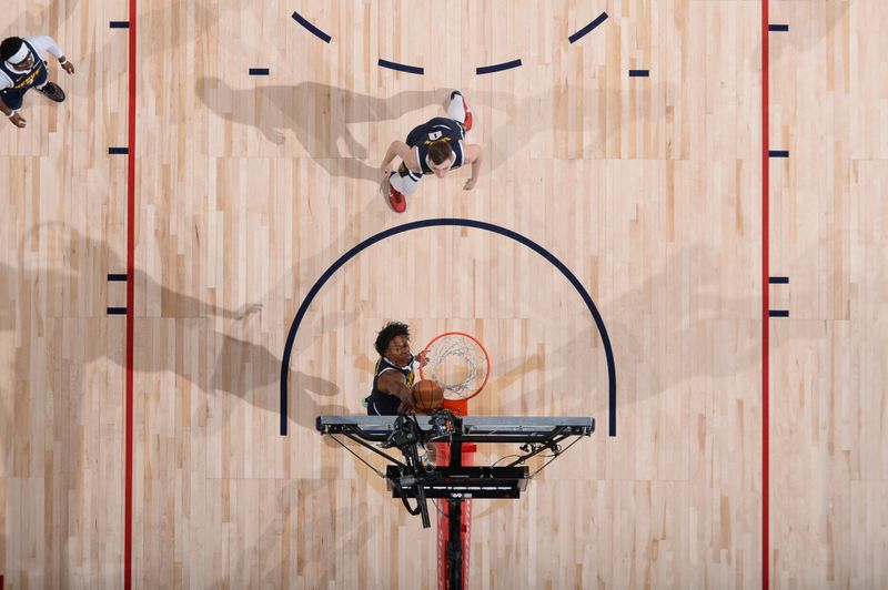 DENVER, CO - APRIL 10: Peyton Watson #8 of the Denver Nuggets shoots the ball during the game against the Minnesota Timberwolves on April 10, 2024 at the Ball Arena in Denver, Colorado. NOTE TO USER: User expressly acknowledges and agrees that, by downloading and/or using this Photograph, user is consenting to the terms and conditions of the Getty Images License Agreement. Mandatory Copyright Notice: Copyright 2024 NBAE (Photo by Bart Young/NBAE via Getty Images)