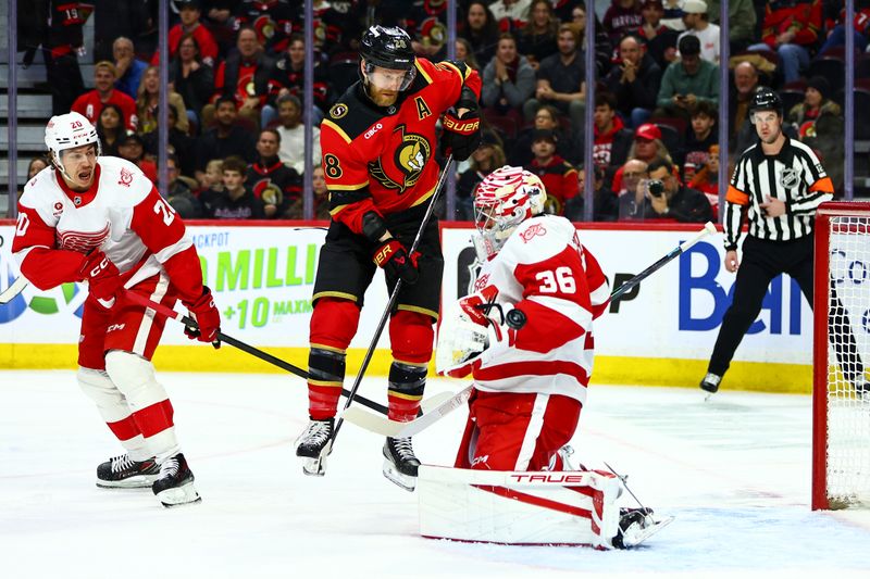 Feb 26, 2026; Ottawa, Ontario, CAN; Detroit Red Wings goaltender John Gibson (36) and defenseman Albert Johansson (20) defend against Ottawa Senators right wing Claude Giroux (28) during the first period at Canadian Tire Centre. Mandatory Credit: Keito Newman-Imagn Images