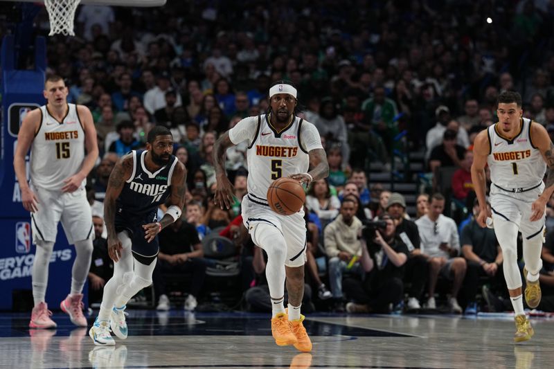 DALLAS, TX - MARCH 17: Kentavious Caldwell-Pope #5 of the Denver Nuggets handles the ball during the game against the Dallas Mavericks on March 17, 2024 at the American Airlines Center in Dallas, Texas. NOTE TO USER: User expressly acknowledges and agrees that, by downloading and or using this photograph, User is consenting to the terms and conditions of the Getty Images License Agreement. Mandatory Copyright Notice: Copyright 2024 NBAE (Photo by Glenn James/NBAE via Getty Images)