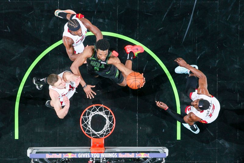 NEW ORLEANS, LA - FEBRUARY 23: Herb Jones #5 of the New Orleans Pelicans drives to the basket during the game against the Miami Heat on February 23, 2024 at the Smoothie King Center in New Orleans, Louisiana. NOTE TO USER: User expressly acknowledges and agrees that, by downloading and or using this Photograph, user is consenting to the terms and conditions of the Getty Images License Agreement. Mandatory Copyright Notice: Copyright 2024 NBAE (Photo by Layne Murdoch Jr./NBAE via Getty Images)