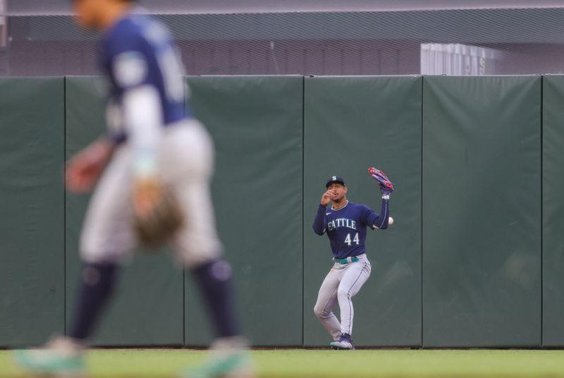 Jul 5, 2023; San Francisco, California, USA; Seattle Mariners center fielder Julio Rodriguez (44) drops the ball during the fifth inning against the San Francisco Giants at Oracle Park. Mandatory Credit: Sergio Estrada-USA TODAY Sports