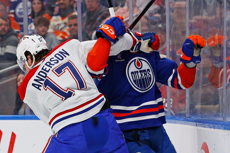Mar 6, 2025; Edmonton, Alberta, CAN; Montreal Canadiens forward Josh Anderson (17) checks Edmonton Oilers defensemen Brett Kulak (27)  during the second period at Rogers Place. Mandatory Credit: Perry Nelson-Imagn Images